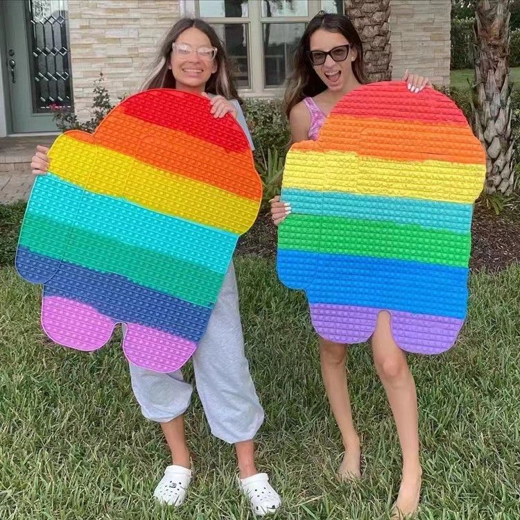 two girls holding two 85cm biggest pop it in the world kibtoy two girls holding two 85cm biggest pop it in the world kibtoy