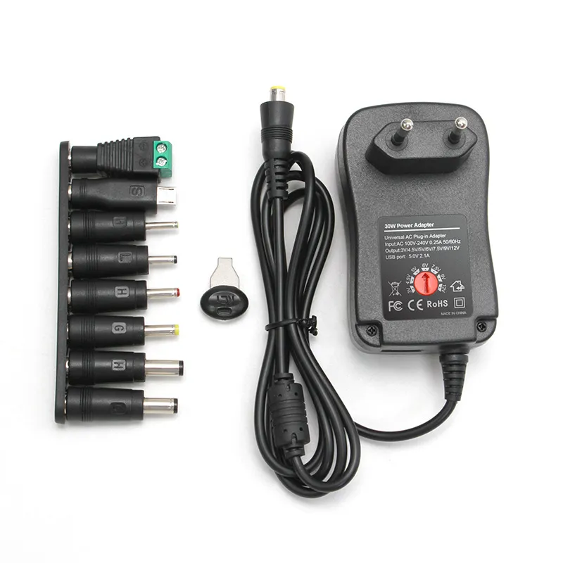 Picture of Multifunctional charger with adjustable 3-12v American standard power adapter comes with (8 heads) compatible with various devices for power supply